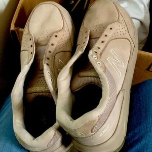 They are new balance shoes lightly worn